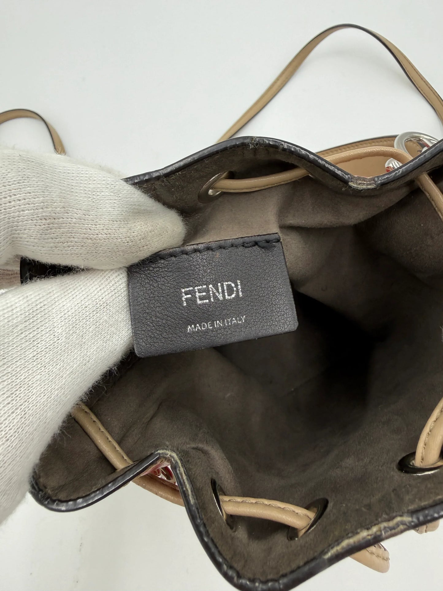 Fendi-Borsa-a-Secchiello-Mon-Tresor-Mini-in-Pelle-Zucca-Embossed-Rosso-70314488070468 - Pally Vintage Closet