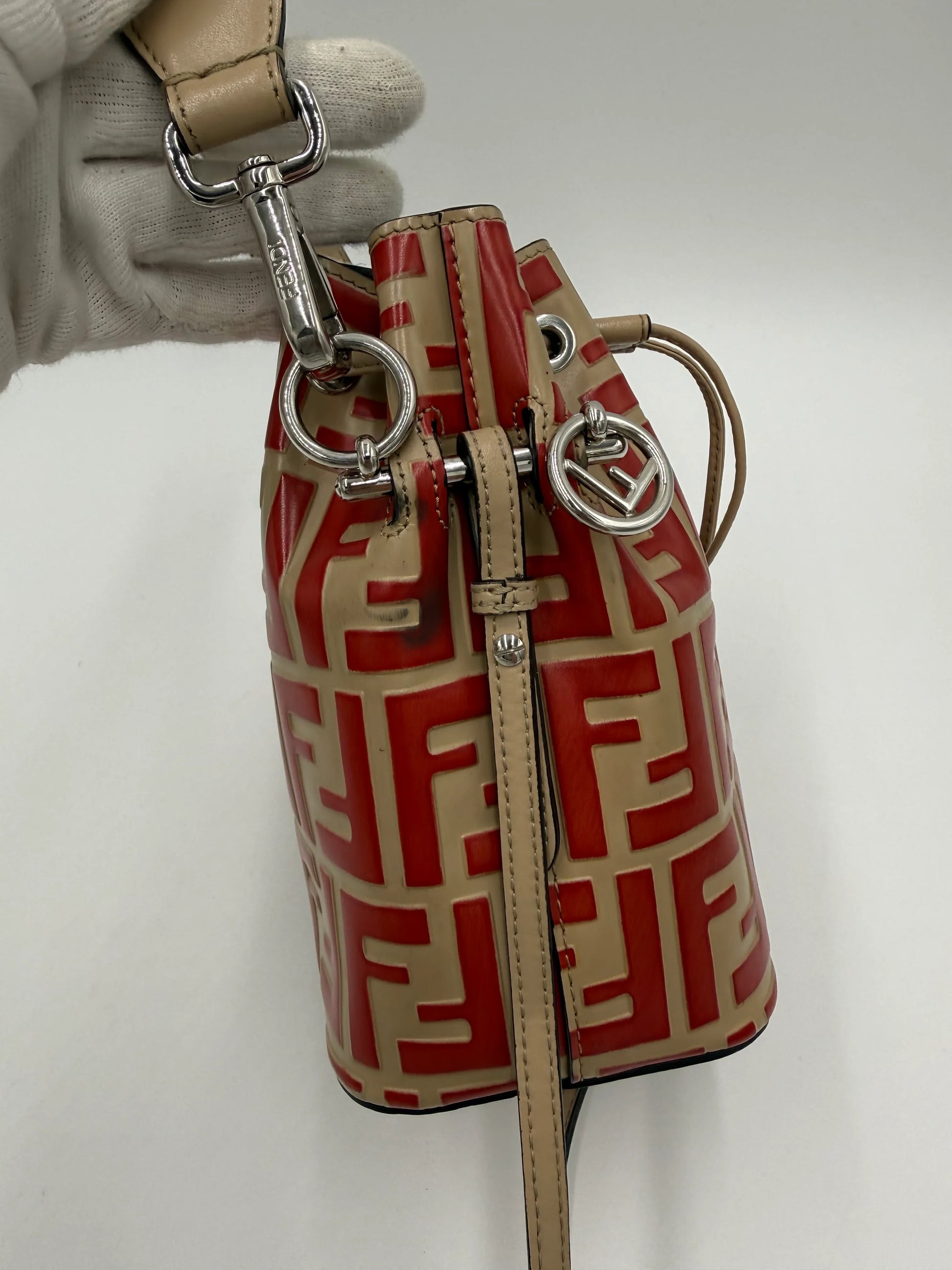 Fendi-Borsa-a-Secchiello-Mon-Tresor-Mini-in-Pelle-Zucca-Embossed-Rosso-70314488168772 - Pally Vintage Closet
