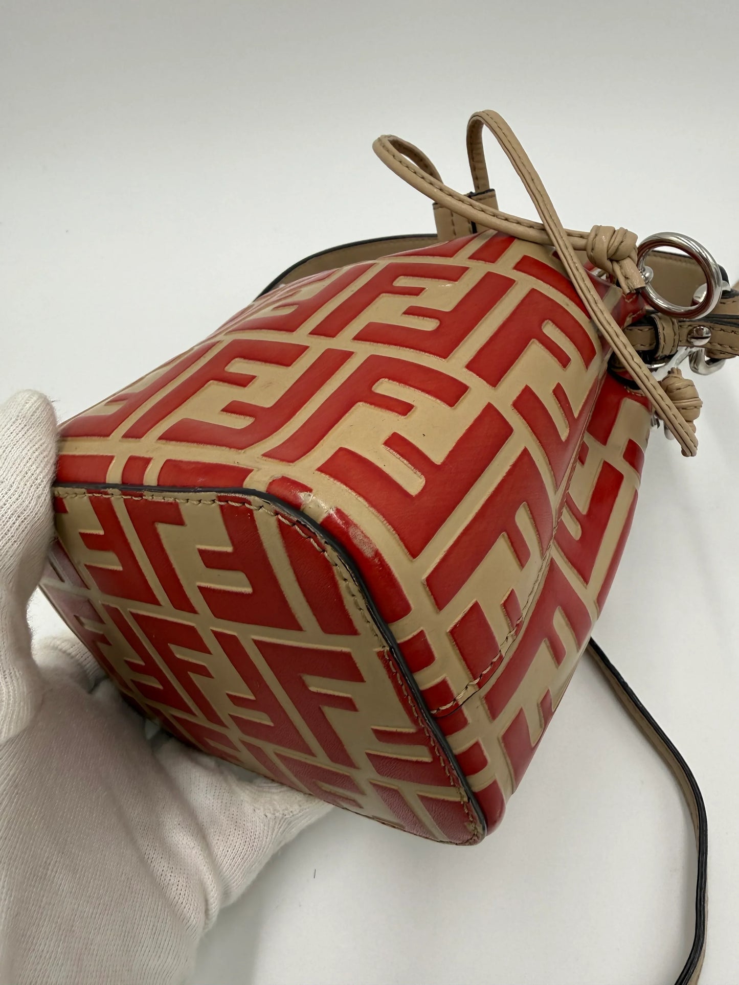 Fendi-Borsa-a-Secchiello-Mon-Tresor-Mini-in-Pelle-Zucca-Embossed-Rosso-70314488299844 - Pally Vintage Closet