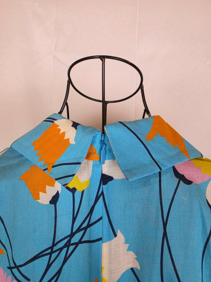 Gucci-Abito-Midi-in-Misto-Lino-Stampa-Floreale-Tulipani-Celeste-70401871610180 - Pally Vintage Closet