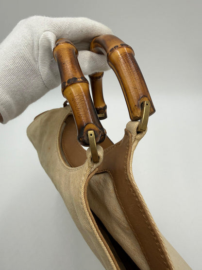 Gucci-Borsa-Vintage-con-Manici-in-Bamboo-e-Dettagli-Intrecciati-Beige-70493924819268 - Pally Vintage Closet