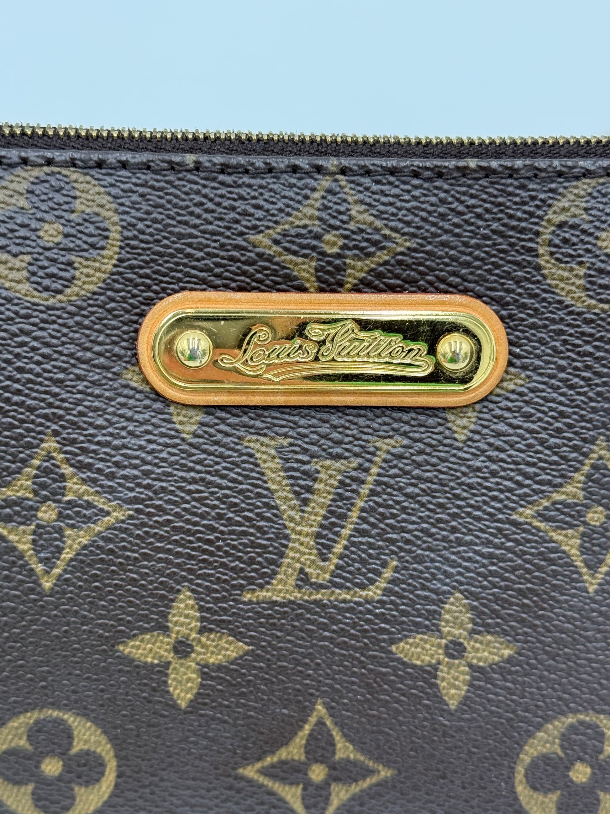 Louis Vuitton Borsa Eva Clutch Monogram Canvas Marrone - Pally Vintage Closet